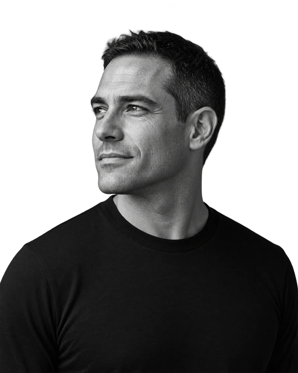 Black-and-white men’s health portrait facing left with natural skin texture and a transparent background